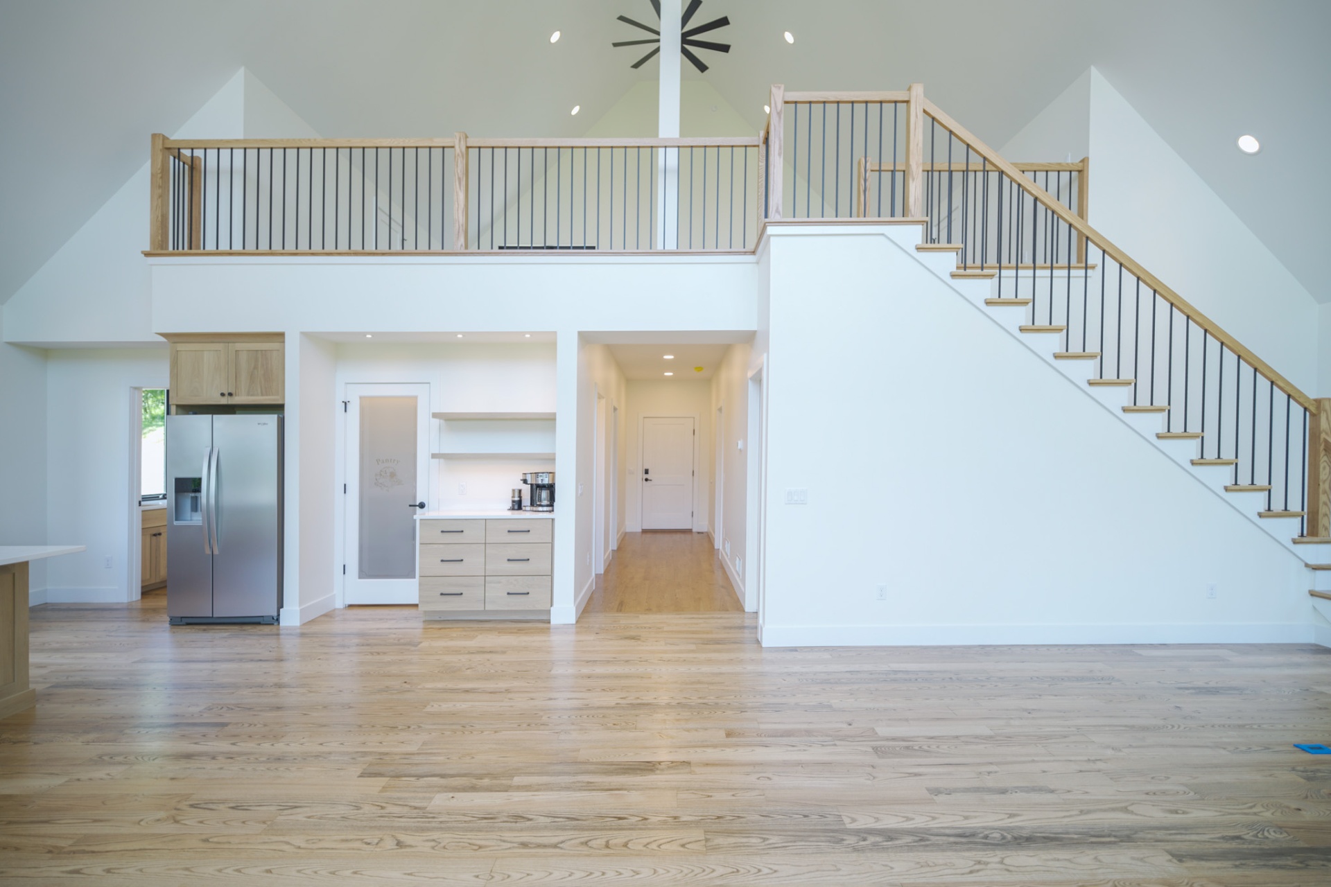 The Tuscarora — great room with loft and staircase