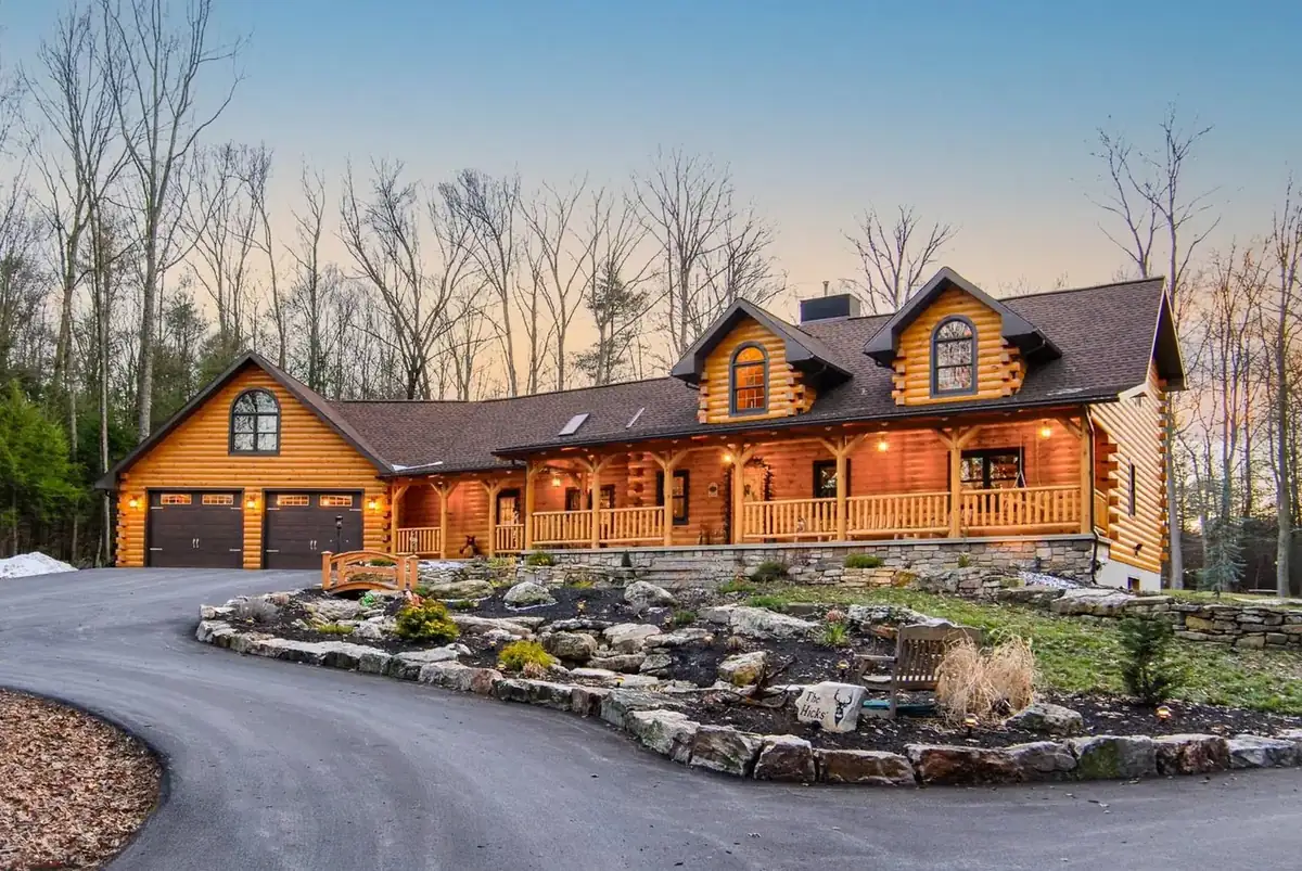 Custom white pine log home package exterior by KSM Log Homes and Timber Packages