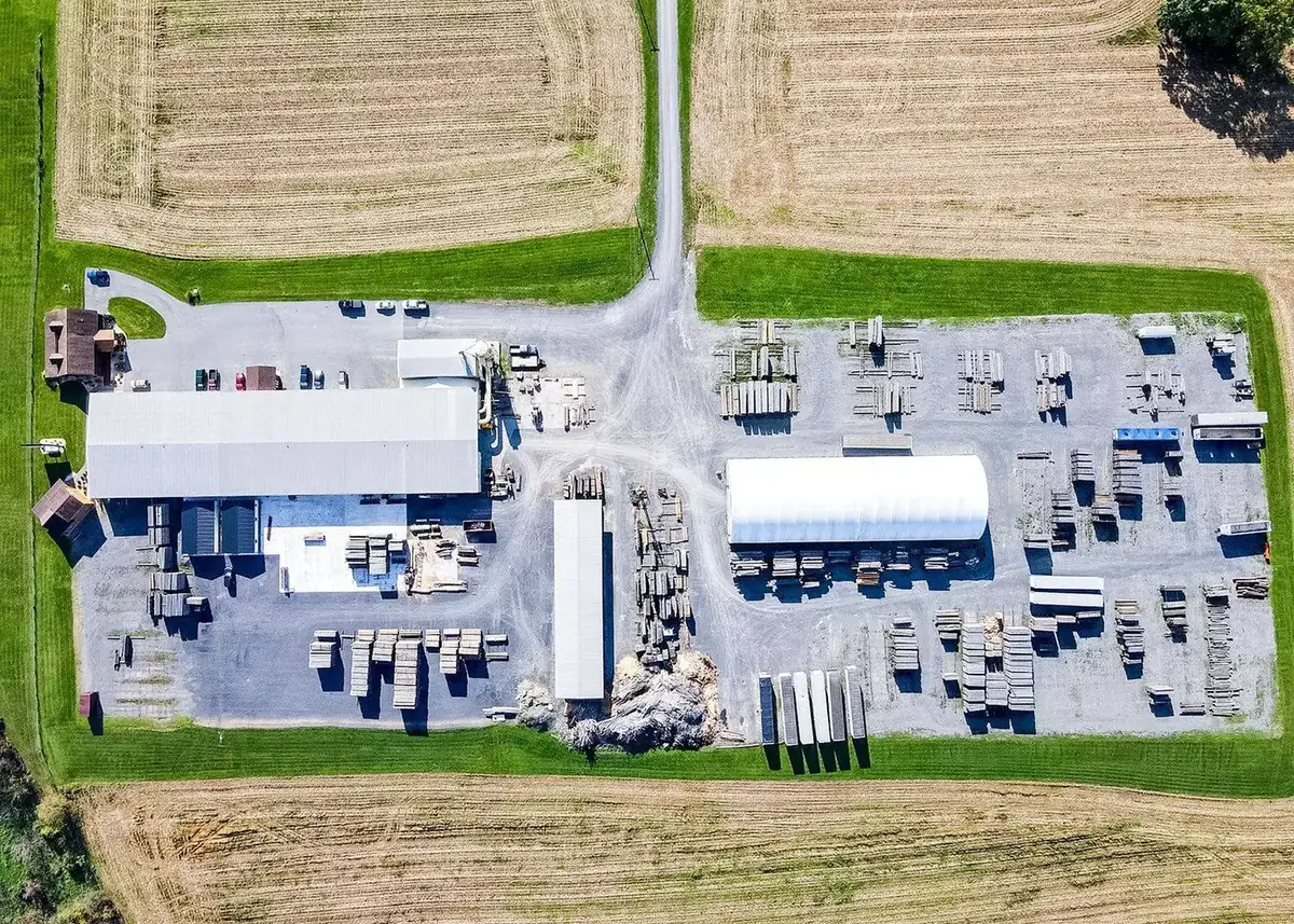 Aerial view of KSM Log Homes and Timber Packages production campus and lumber yard